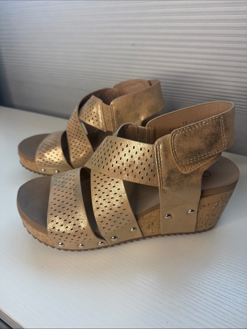 Corkys Womens Guilty Pleasure Metallic Studded
Perforated Wedge Slingback